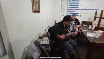 someone playing guitar
