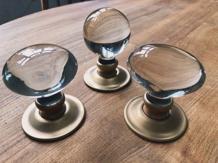 What an elegant trio of fine glass door knobs #interiordesig