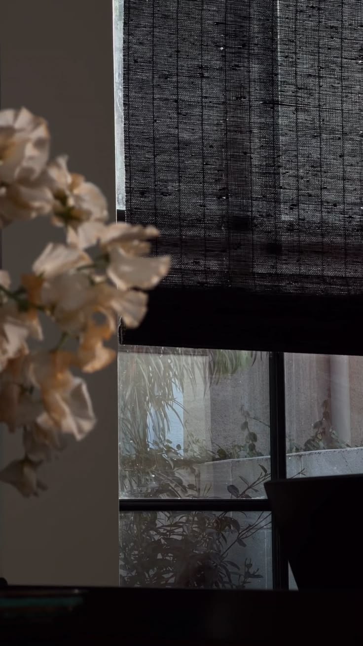 Winding down with automated woven wood shades. ☀️ Natural wo