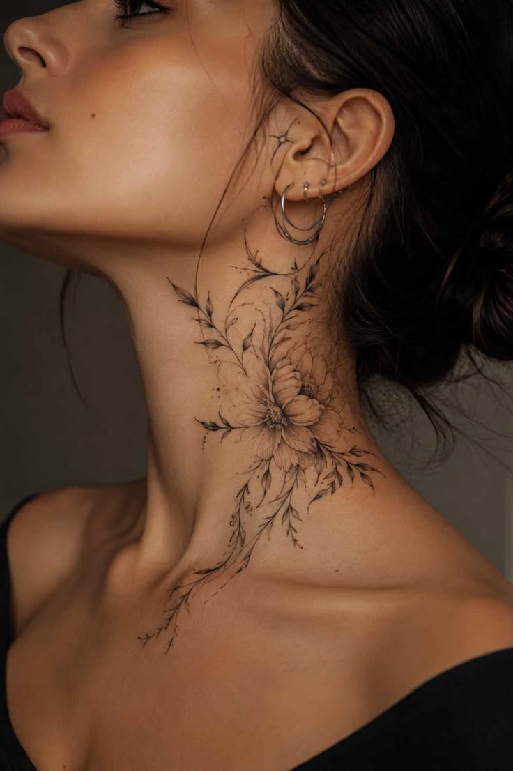 Elegant floral neck tattoo featuring a detailed flower with 