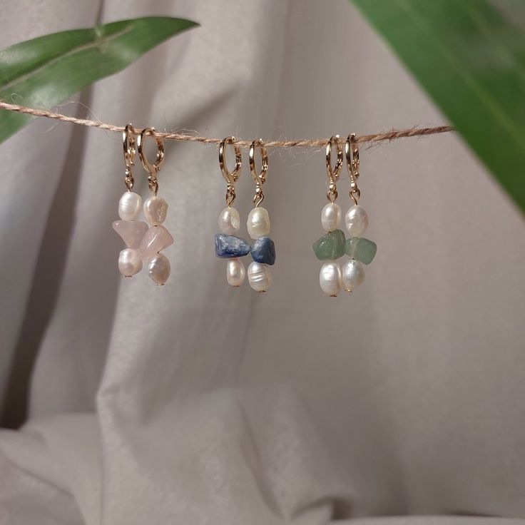 Introducing our exquisite handmade earrings adorned with fre