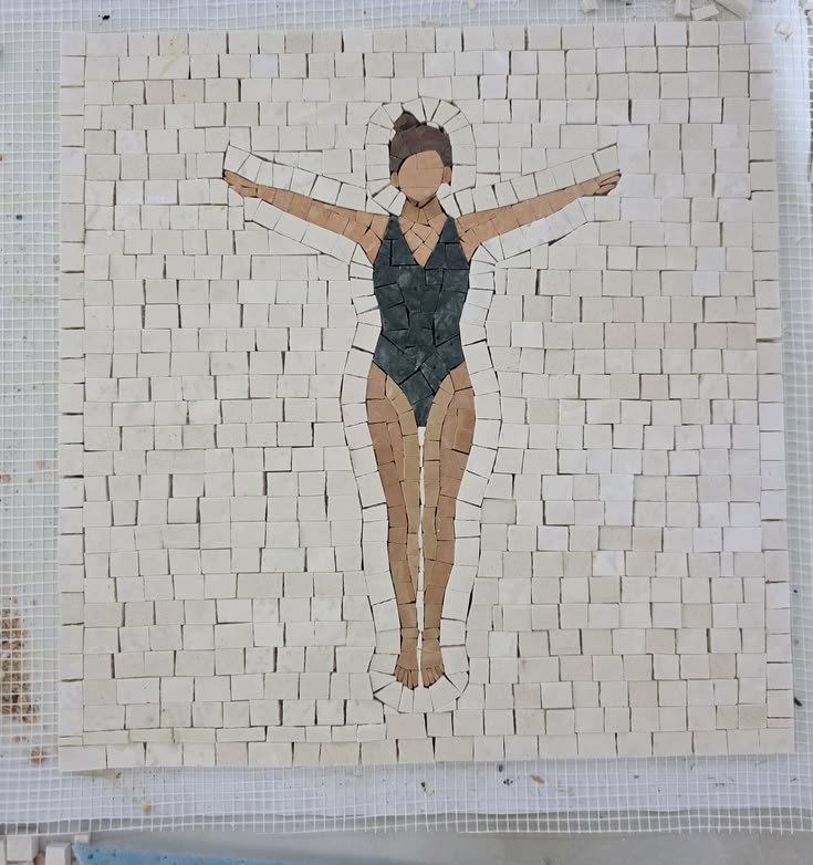 Handmade swimmer mosaic crafted from natural marble, perfect