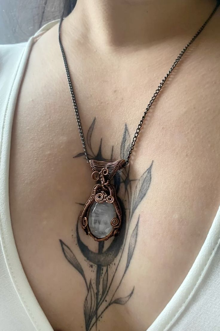 This handmade copper wire wrapped quartz necklace is the per
