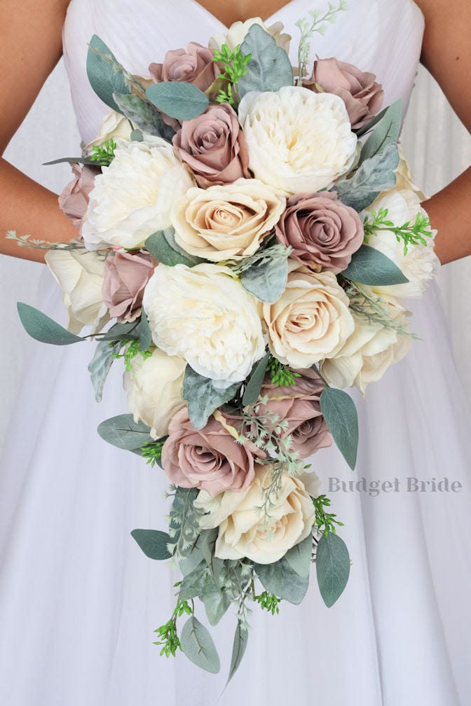 This is a cascading brides bouquet with a combination of ivo