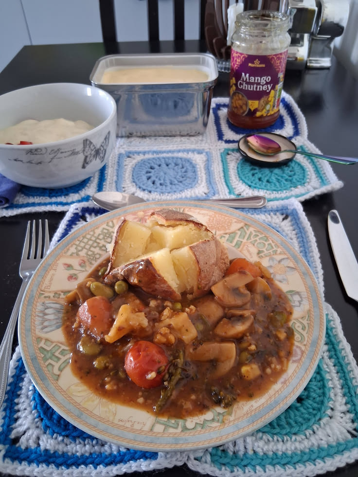 Leftover veggie curry and a jacket potato.