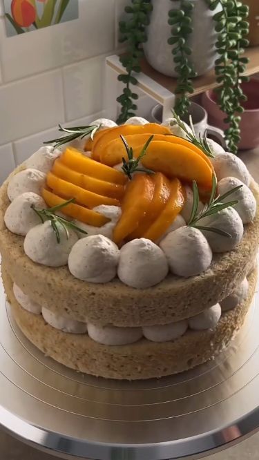This peaches and cream cake is made with two layers of soft 