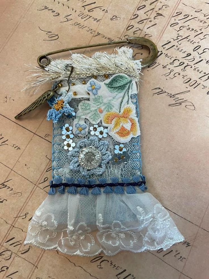 This beautiful hand stitched brooch is made using 100% light