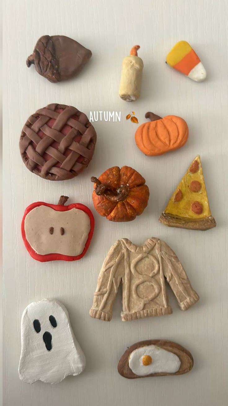 Clay pumpkin, candy corn, pizza, ghost, sweater, apple, acor