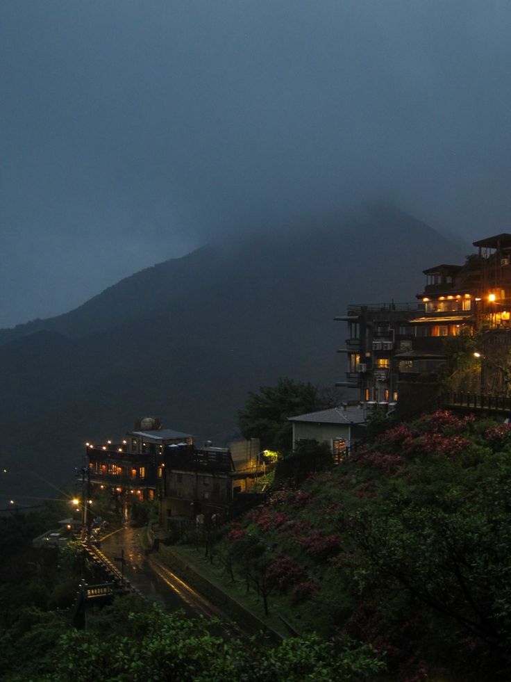 mountain view with fog dark ghibli aesthetic