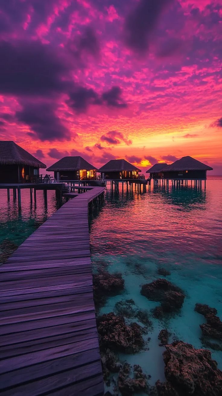 Experience the luxury of an Overwater Bungalow Sunset with a