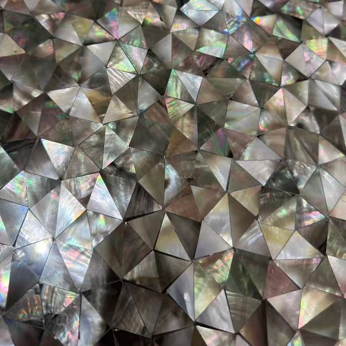 Get wild with our genuine seashell triangle mosaic. An abstr