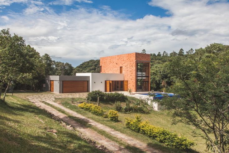 Private Home designed by Q_arts Arquitetura in Itaara, Rio G