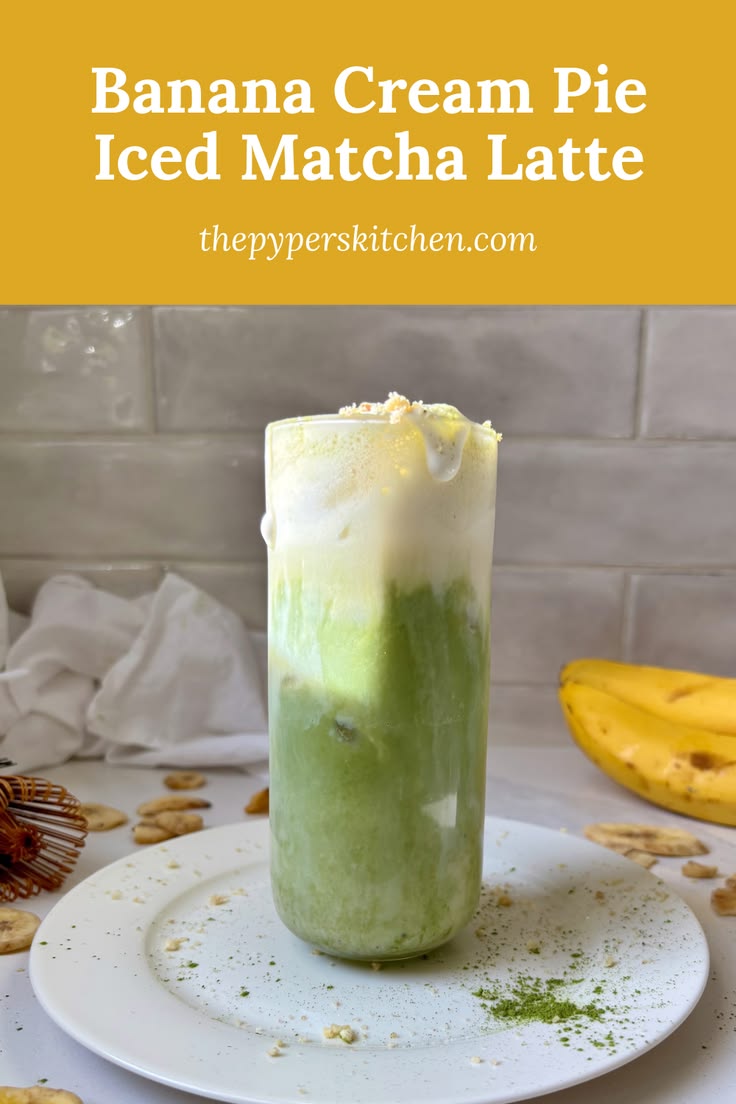 A tall glass of iced matcha latte layered with homemade bana