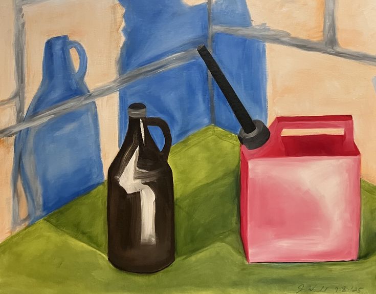 An empty beer growler and a gas tank sitting on a table in t