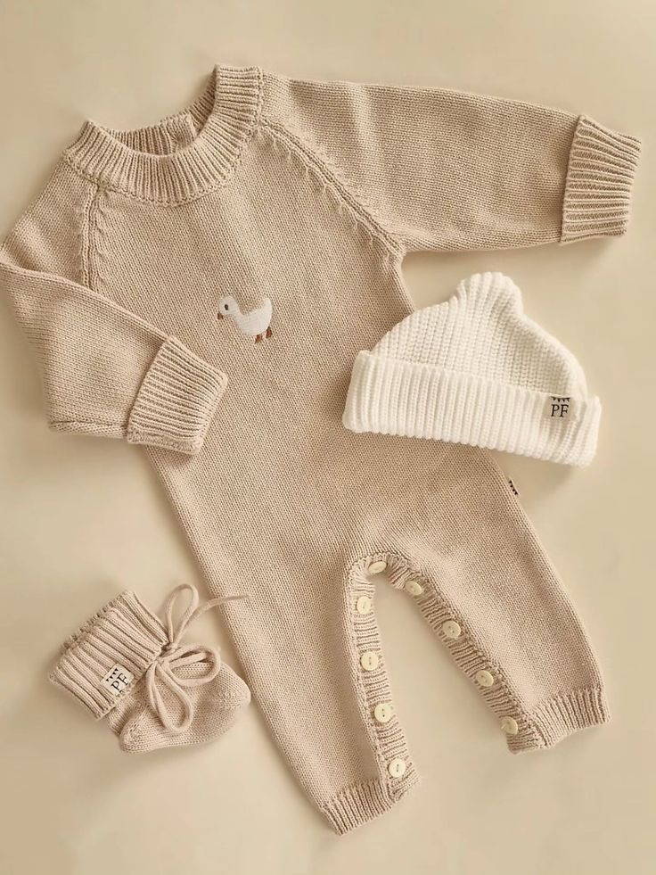 Oatmeal or Soft Yellow? Our bestselling Knitted Playsuits fo