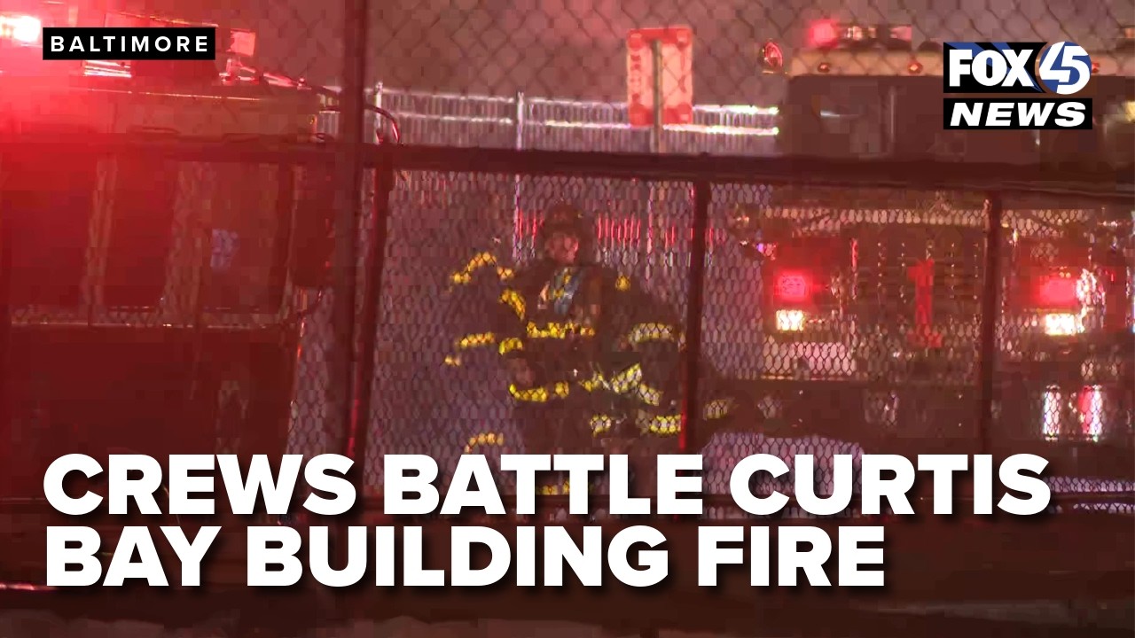 Crews battling building fire in Curtis Bay